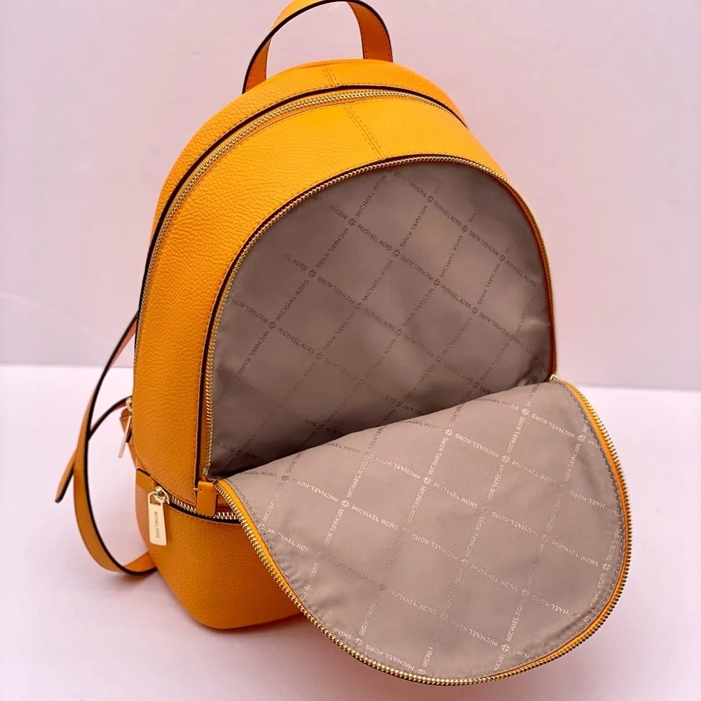 Michael Kors Vibrant Orange Backpack with Fun Patches